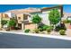 Charming contemporary home featuring xeriscaping, neutral tones, a two-car garage, and mountain views at 6433 Farness St, Las Vegas, NV 89135