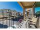 Balcony with a seating area and views of the neighborhood at 6953 Midnight Bronze St, North Las Vegas, NV 89086
