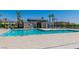 Community pool with a modern pool house and plenty of space for residents to enjoy at 6953 Midnight Bronze St, North Las Vegas, NV 89086
