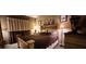 Inviting bedroom features a large bed, soft lighting, and tasteful decor at 7395 Howell Mill Ct, Las Vegas, NV 89113