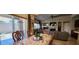 Dining area with backyard view and adjacent to living room at 7395 Howell Mill Ct, Las Vegas, NV 89113