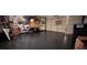 Spacious garage with painted floor, offering ample storage and parking space at 7395 Howell Mill Ct, Las Vegas, NV 89113