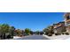Picturesque street view showcasing well-maintained homes and lush landscaping at 7395 Howell Mill Ct, Las Vegas, NV 89113