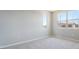 Comfortable bedroom with dual windows providing great natural light and plush carpet flooring at 769 Cloud Creek St, Henderson, NV 89011