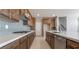 Bright, modern kitchen with an island, stainless steel appliances, and lots of cabinet space at 769 Cloud Creek St, Henderson, NV 89011