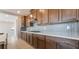 Stylish kitchen with stainless steel appliances, ample cabinet space, and a gas cooktop at 769 Cloud Creek St, Henderson, NV 89011
