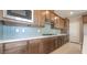 Modern kitchen showcasing stainless steel appliances, ample cabinetry, and sleek countertops at 769 Cloud Creek St, Henderson, NV 89011