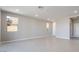 Spacious living area with tiled floors, recessed lighting, and a neutral color scheme at 769 Cloud Creek St, Henderson, NV 89011