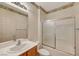 Traditional bathroom features a vanity with floral wallpaper at 7916 Lyrebird Dr, North Las Vegas, NV 89084