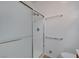 Shower area with glass enclosure in a bright bathroom at 7916 Lyrebird Dr, North Las Vegas, NV 89084