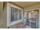Balcony with a table and sliding glass doors that let the sunshine in and gives a great view at 7950 W Flamingo Rd # 1042, Las Vegas, NV 89147