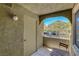 The private balcony invites you to enjoy the fresh air, featuring an inviting arch with outdoor seating at 7950 W Flamingo Rd # 1042, Las Vegas, NV 89147