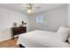 Bedroom with ceiling fan and window at 7950 W Flamingo Rd # 1042, Las Vegas, NV 89147