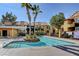 Community pool area with a separate spa and ample space for lounging at 7950 W Flamingo Rd # 1042, Las Vegas, NV 89147