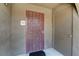 The secure entrance to this charming home ensures peace of mind and safety at 7950 W Flamingo Rd # 1042, Las Vegas, NV 89147