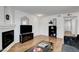 Bright living room with fireplace and wood floors, offers a cozy and inviting atmosphere at 7950 W Flamingo Rd # 1042, Las Vegas, NV 89147