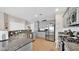 Well-equipped kitchen with granite countertops, tile backsplash, and stainless steel appliances at 8139 Skytop Ledge Ave, Las Vegas, NV 89178