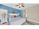 Bright main bedroom with ceiling fan, neutral walls, en-suite bathroom, and comfortable furnishings at 8139 Skytop Ledge Ave, Las Vegas, NV 89178