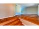 Inviting living room featuring hardwood floors and neutral paint, great for entertaining at 8729 Pesaro Dr, Las Vegas, NV 89117