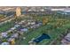 Aerial view showcasing mature trees and lush green golf course near residences at 882 Tam O Shanter, Las Vegas, NV 89109