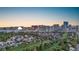 Beautiful Las Vegas cityscape with golf course, homes, resorts, and Sphere against the sunset at 882 Tam O Shanter, Las Vegas, NV 89109