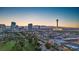 Expansive Las Vegas skyline aerial shot featuring city lights, the Stratosphere, and distant mountains at 882 Tam O Shanter, Las Vegas, NV 89109