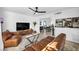 Open concept living room with a view of dining area, kitchen, and modern decor at 882 Tam O Shanter, Las Vegas, NV 89109