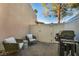 Private patio with comfortable seating and grill for outdoor dining and relaxation at 882 Tam O Shanter, Las Vegas, NV 89109