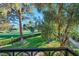 Picturesque view of the lush green golf course from the home's private balcony at 882 Tam O Shanter, Las Vegas, NV 89109