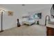 Minimalist bedroom featuring a bunk bed, carpet, and lamp at 9180 Mohawk St, Las Vegas, NV 89139