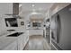 Modern kitchen featuring stainless steel appliances, ample counter space, and sleek cabinetry at 9180 Mohawk St, Las Vegas, NV 89139
