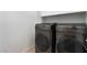 A modern washer and dryer set in a dedicated laundry area, with neutral wall color at 9850 Poplar Point Ave, Las Vegas, NV 89178