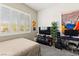 Cozy bedroom features a bright window and carpet flooring at 10160 Tree Blossom Ave, Las Vegas, NV 89166