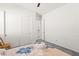 This bedroom features sliding closet doors and neutral colors at 10160 Tree Blossom Ave, Las Vegas, NV 89166