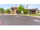 Community center featuring stone and tile exterior with outdoor dining at 10160 Tree Blossom Ave, Las Vegas, NV 89166