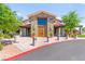 Community center with stone exterior, large entryway, and patio at 10160 Tree Blossom Ave, Las Vegas, NV 89166