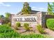 Elegant stone community sign for Skye Mesa, surrounded by lush landscaping, welcomes residents and visitors at 10160 Tree Blossom Ave, Las Vegas, NV 89166