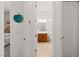 Hallway featuring neutral colors and access to bathroom at 10160 Tree Blossom Ave, Las Vegas, NV 89166