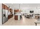 Spacious kitchen featuring a center island and stainless steel appliances with an open floor plan at 10160 Tree Blossom Ave, Las Vegas, NV 89166