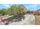 Long driveway with secured gate leading to the charming home at 10343 Beallsville St, Las Vegas, NV 89141