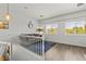 Bright and open bonus room with natural light and cozy seating at 10352 Natural Springs Ave, Las Vegas, NV 89129