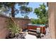 Backyard hot tub provides a private and serene space, surrounded by lush landscaping at 10352 Natural Springs Ave, Las Vegas, NV 89129