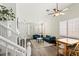 Inviting living area with plantation shutters, vaulted ceilings, and wood flooring at 10352 Natural Springs Ave, Las Vegas, NV 89129