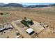 Desert property aerial view showcasing horse property, and desert landscaping at 12992 State Hwy 160, Las Vegas, NV 89161