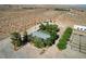 Expansive property featuring desert landscaping, mature trees, and horse property at 12992 State Hwy 160, Las Vegas, NV 89161