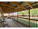 The expansive wooden back deck offers peaceful outdoor living space at 12992 State Hwy 160, Las Vegas, NV 89161
