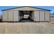 View of the barn and brick floor with open air flow and easy access for horses at 12992 State Hwy 160, Las Vegas, NV 89161