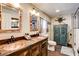 Rustic bathroom features double copper sinks, wood vanity, and modern fixtures at 12992 State Hwy 160, Las Vegas, NV 89161
