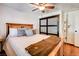 Bedroom featuring a wood frame bed and closet with sliding doors at 12992 State Hwy 160, Las Vegas, NV 89161