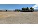 Horse property featuring barns, tree coverage and adequate land for horses at 12992 State Hwy 160, Las Vegas, NV 89161